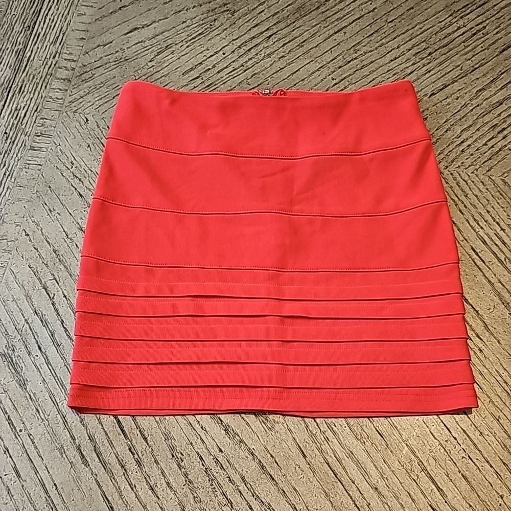 Coral mini skirt size small by Zinga